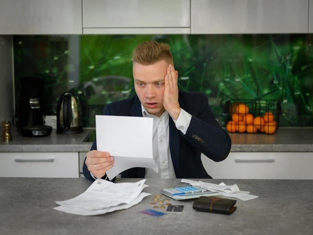 A person looking distressed while surrounded by bills and financial statements, symbolizing the burden of debt.