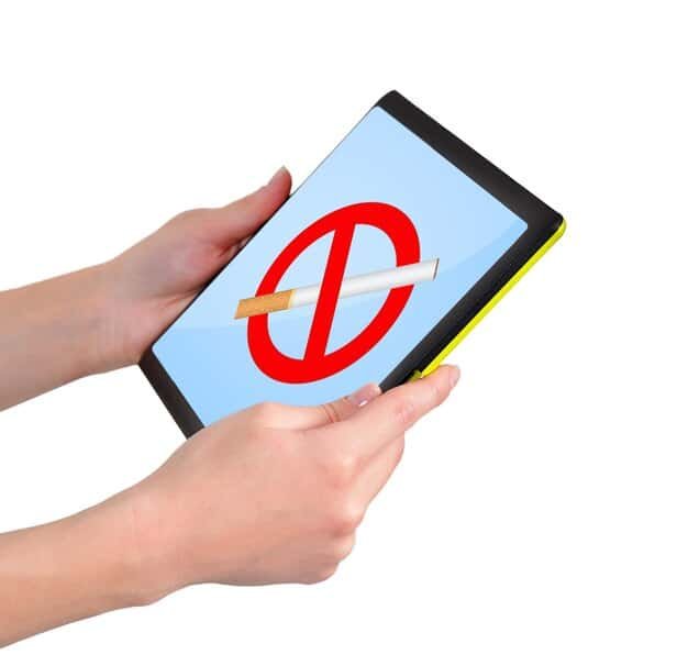 A close-up of a hand pointing at an error on a printed credit report. The error is circled in red, highlighting incorrect payment information.