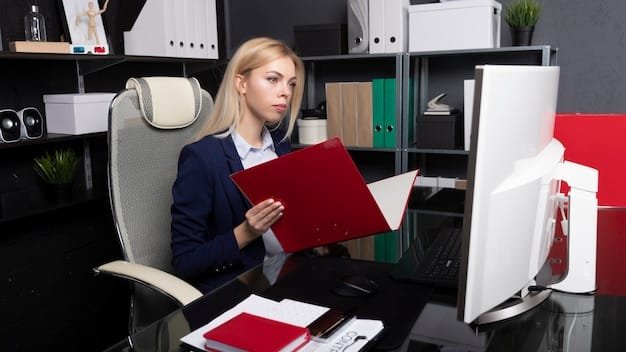 An image of a person composing a formal letter at a desk, with organized files and documents surrounding them. The scene conveys professionalism and attention to detail.