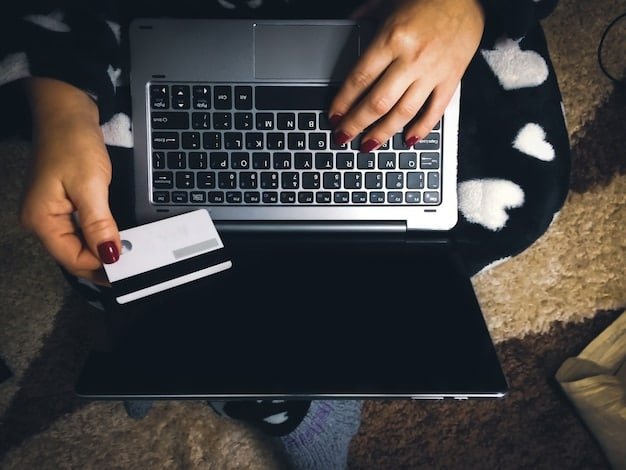 A close-up view of hands typing on a laptop, emphasizing the online process of checking credit reports. A credit card is visible in the background, suggesting financial transactions.