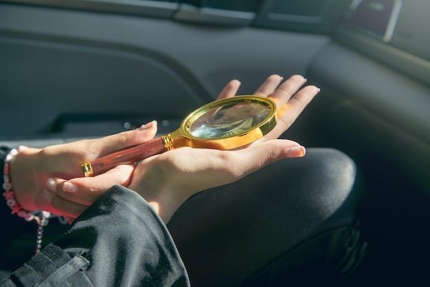 A close-up shot of a hand holding a magnifying glass over a credit report, highlighting the section about credit inquiries. The background is blurred, emphasizing the focus on the credit report details.