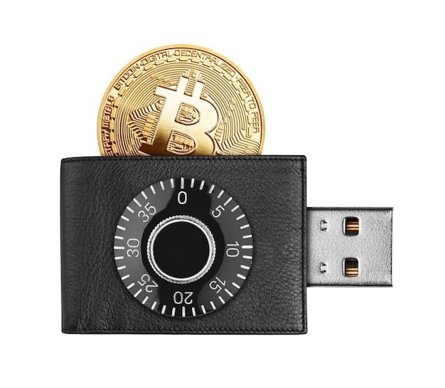 A close-up shot of a hardware crypto wallet (like Ledger or Trezor) being connected to a computer via USB, highlighting the physical security features of the device, such as a screen for address verification.